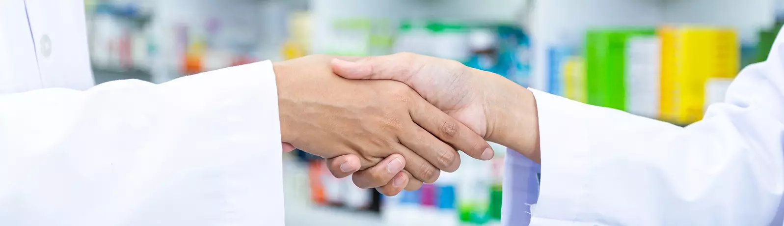 Pharmacists shaking hands